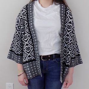 A black and white knit cardigan